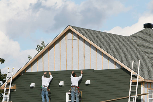 Professional Siding Installation technician working in Rootstown, OH